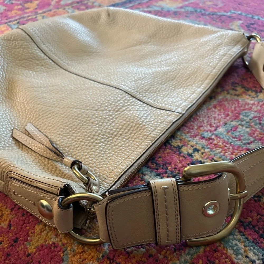 Coach | Women’s cream pebbled leather round bottom over the shoulder purse, OS